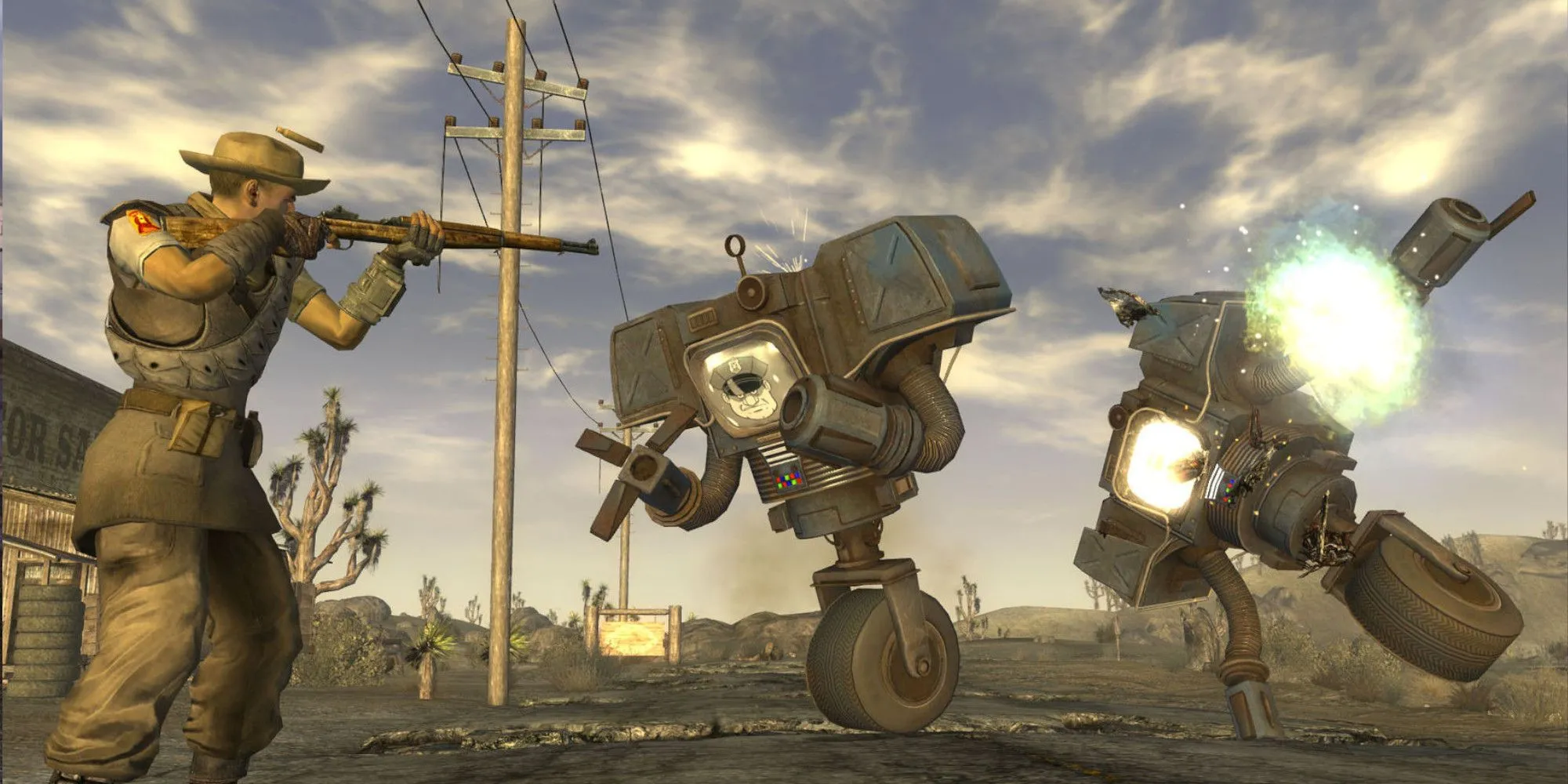 Nhân vật trong Fallout New Vegas chỉ vũ khí, minh họa gameplay sinh tồn trong thế giới hậu tận thế