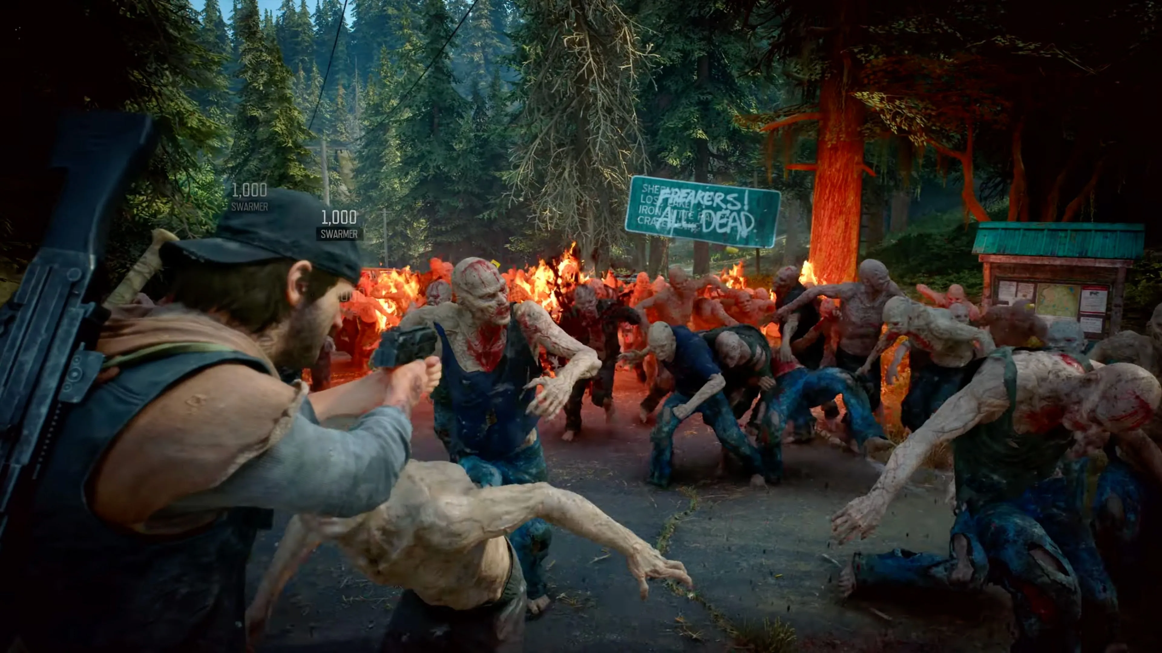 Cảnh ingame Days Gone Remastered với Deacon St. John đối mặt với bầy Freakers khổng lồ trong một môi trường đổ nát.