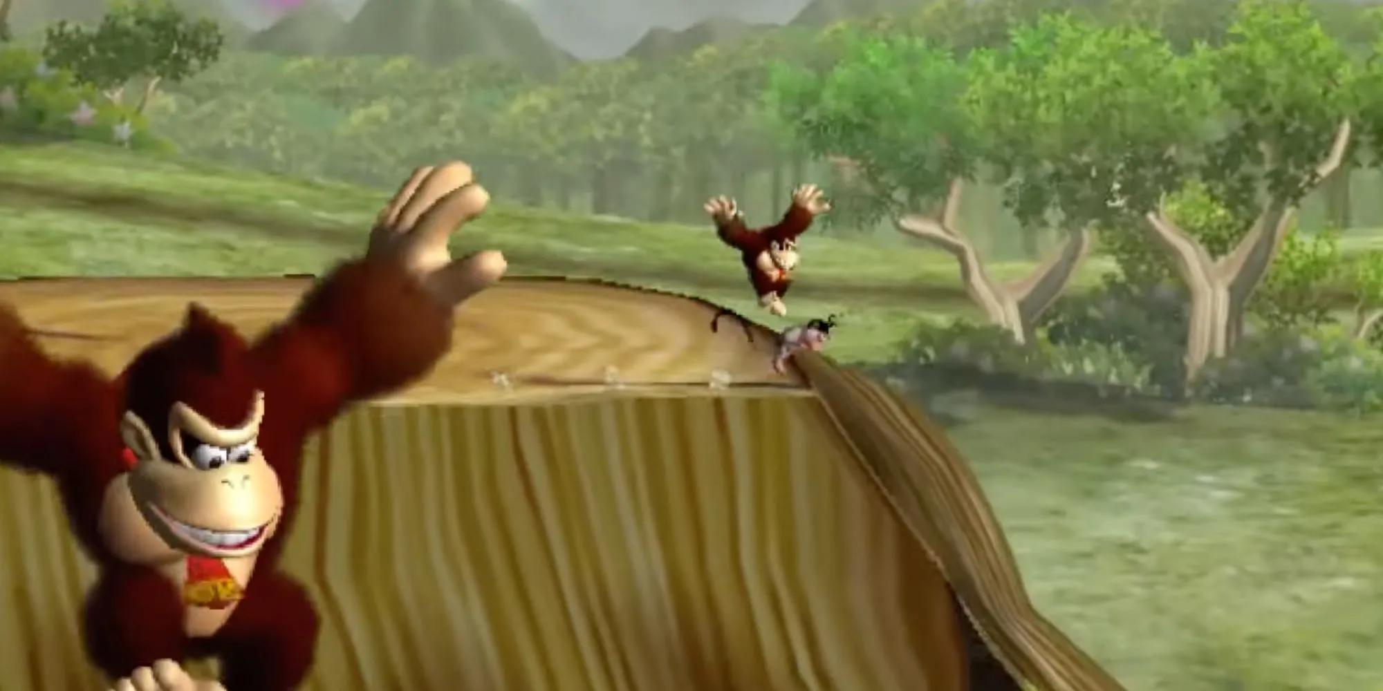 Donkey Kong thực hiện cú nhảy trong tựa game Jungle Beat trên Nintendo GameCube.