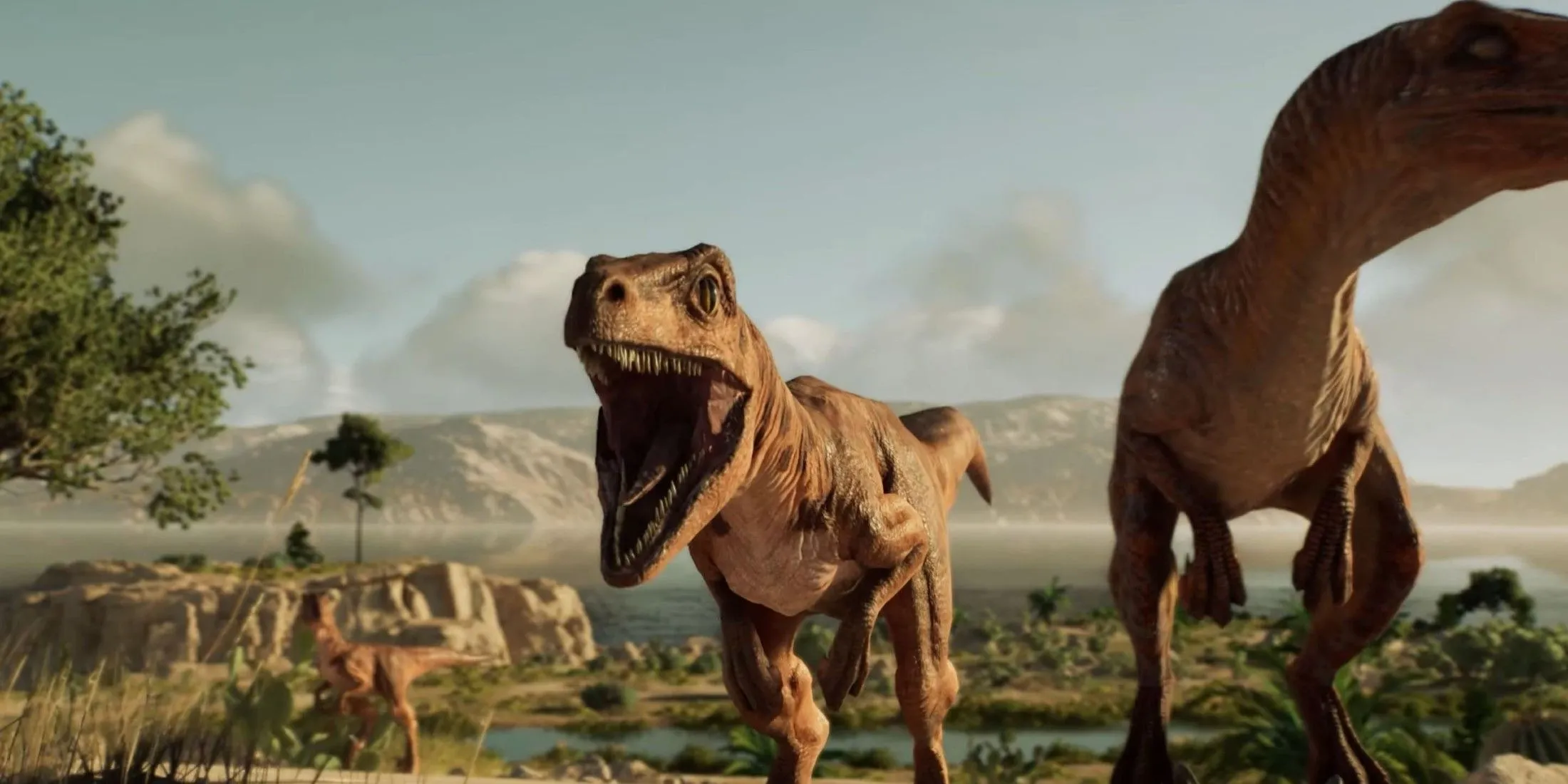 Hai con Velociraptor trưởng thành và Velociraptor con trong môi trường sống của Jurassic World Evolution 3, minh họa đơn vị gia đình khủng long