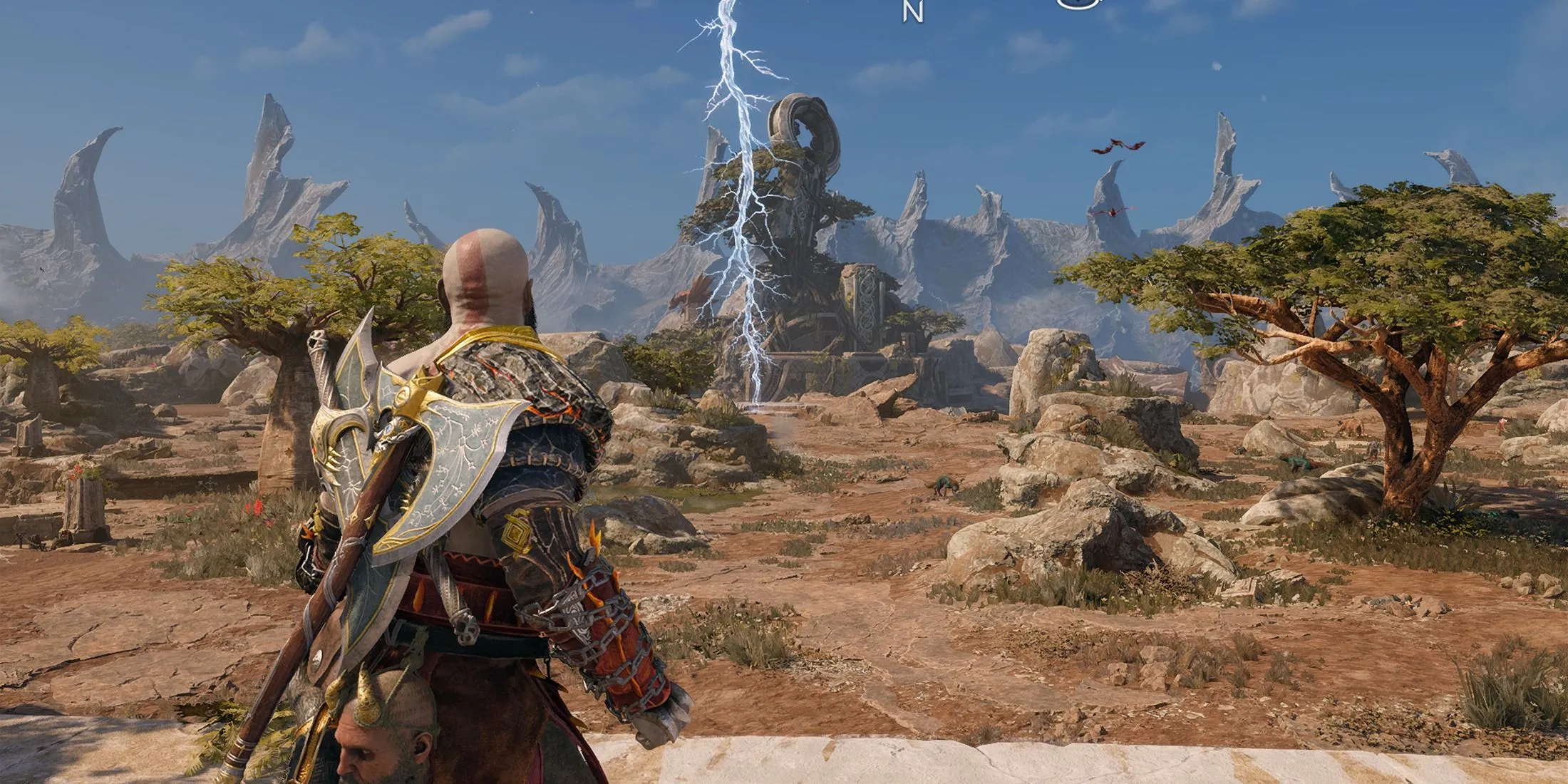 Khung cảnh The Crater vùng Vanaheim trong God of War Ragnarok với Kratos và Mimir