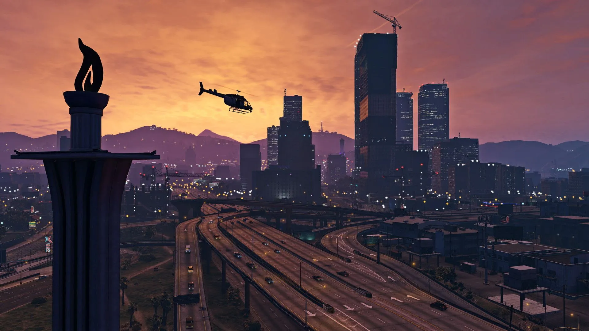 Trực thăng bay qua các đường cao tốc và tòa nhà chọc trời tại Los Santos vào hoàng hôn trong GTA 5.
